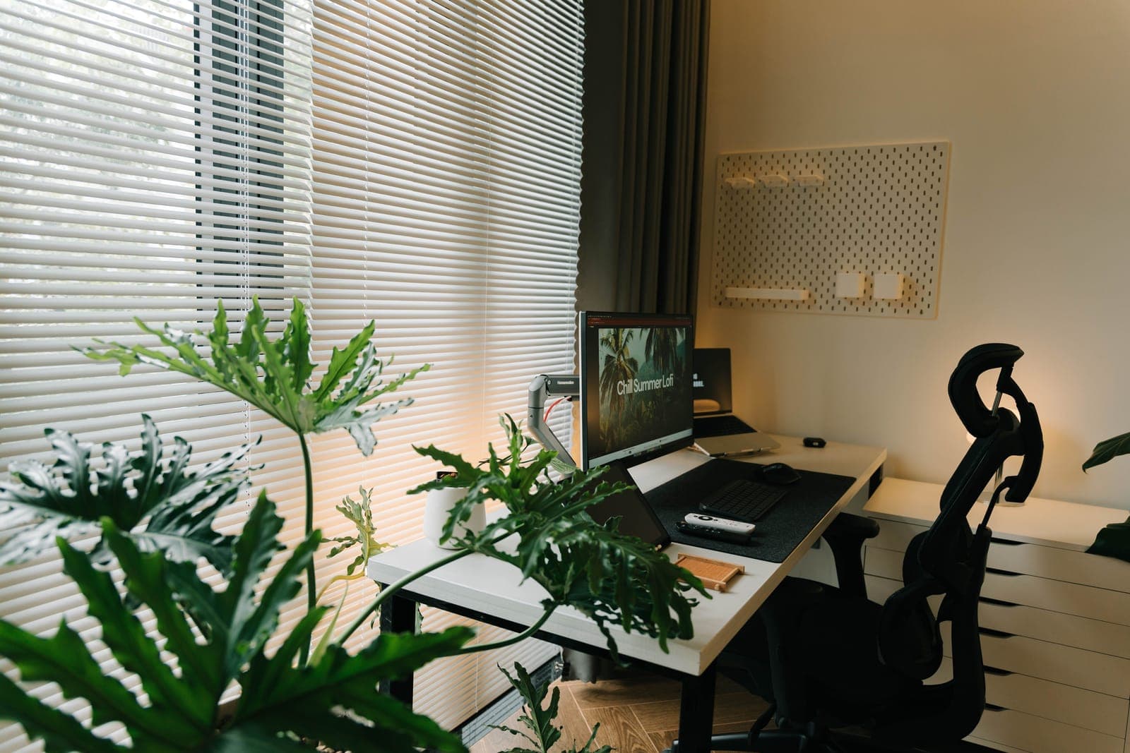 A kneeling chair positioned at a home office desk