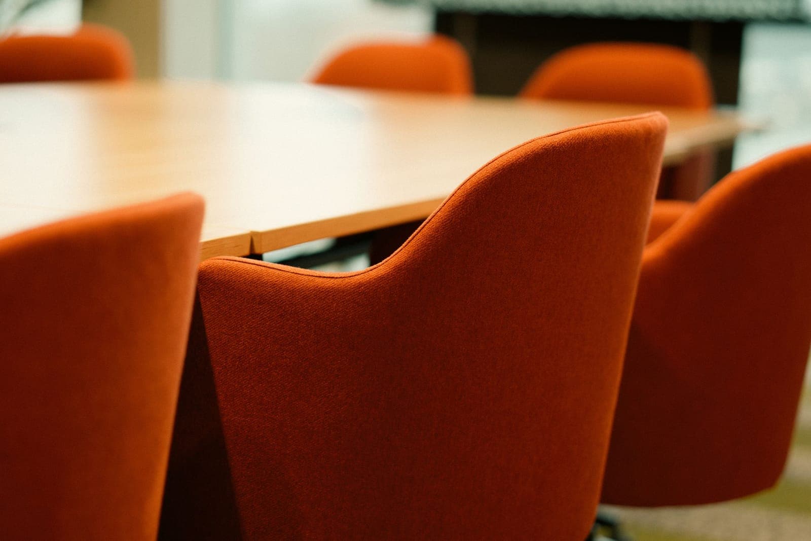 An affordable mesh task chair in a plain room