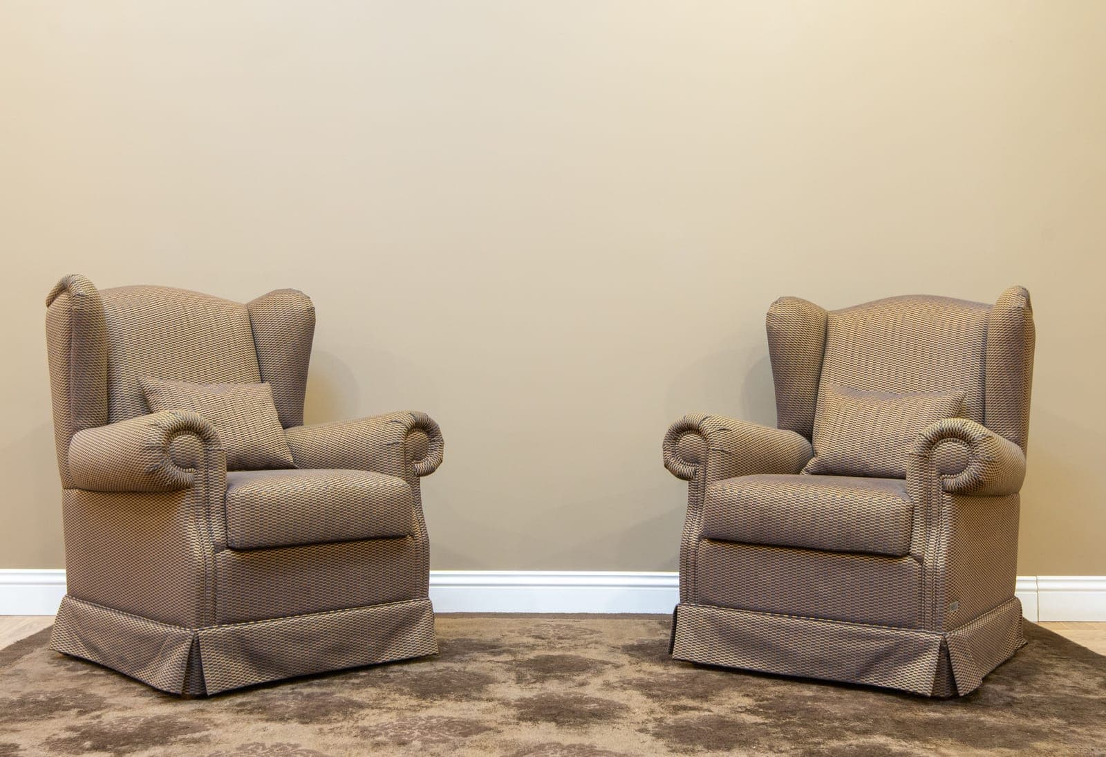 Two ergonomic office chairs facing each other