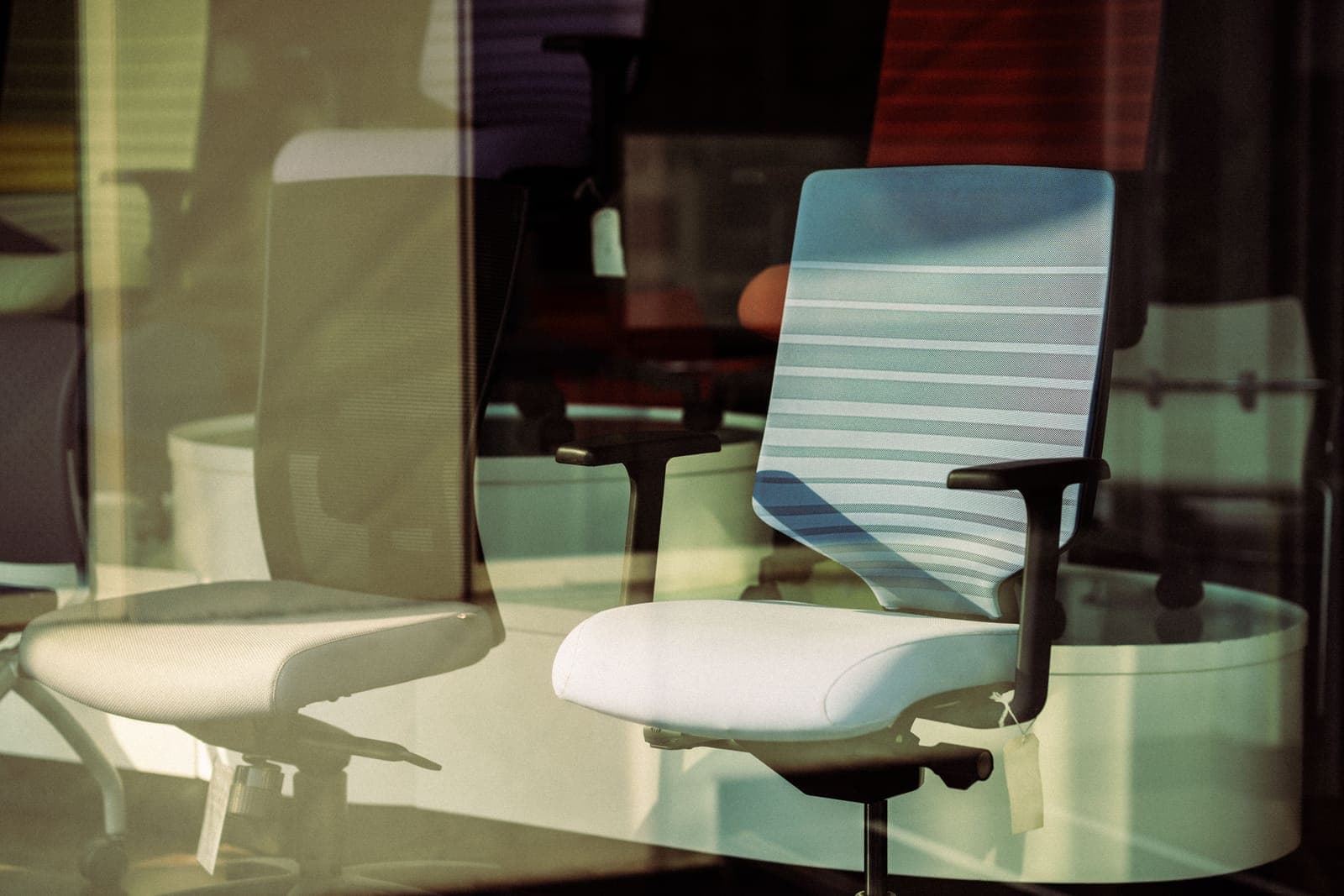 U-shaped memory foam seat cushion on an office chair seat pan